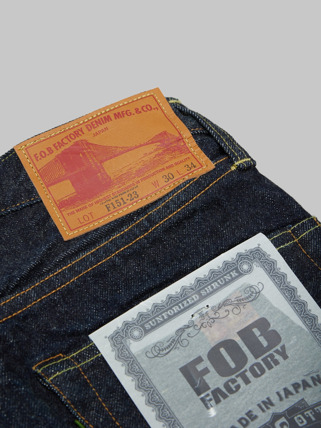 Fob factory slim straight denim jeans brand leather patch