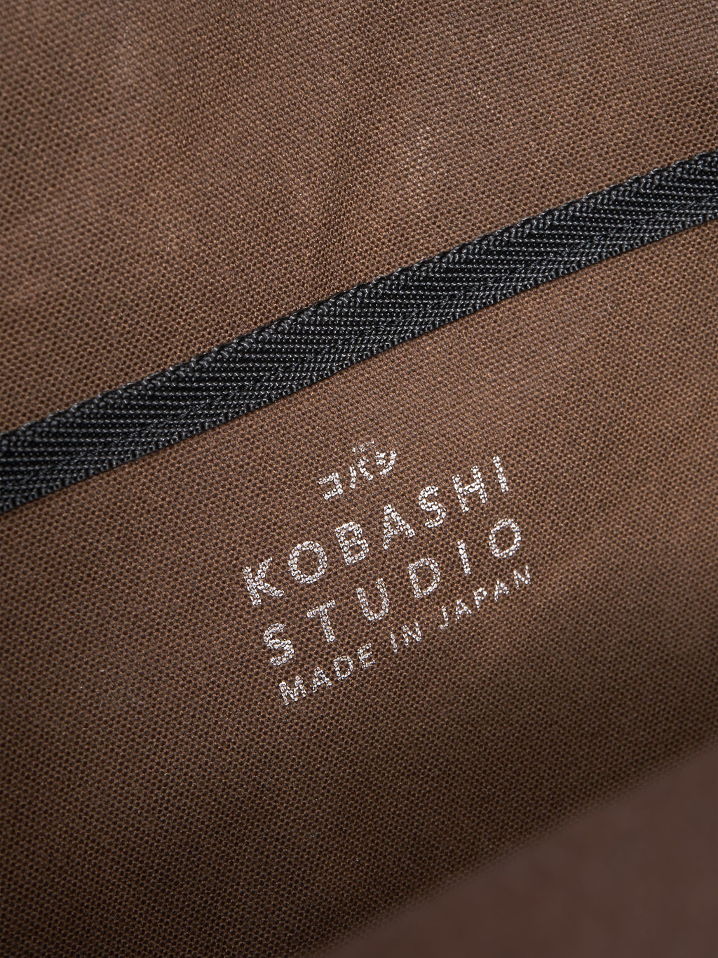 Kobashi Studio Standard Backpack Brown logo
