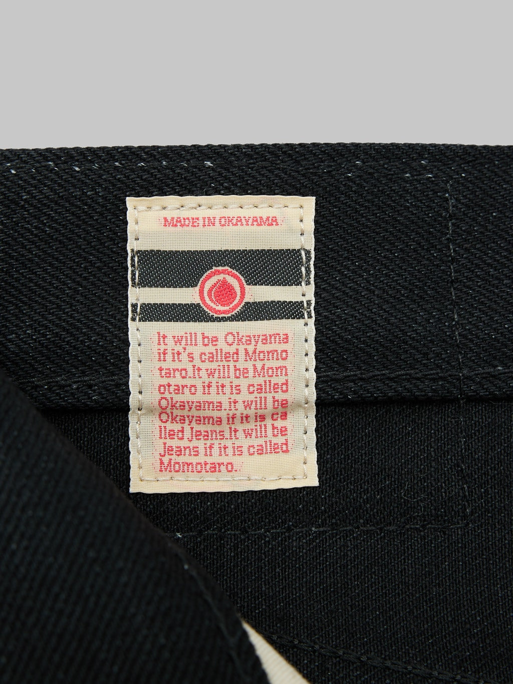 Momotaro 0306B Black x Black Tight Tapered Jeans interior tag