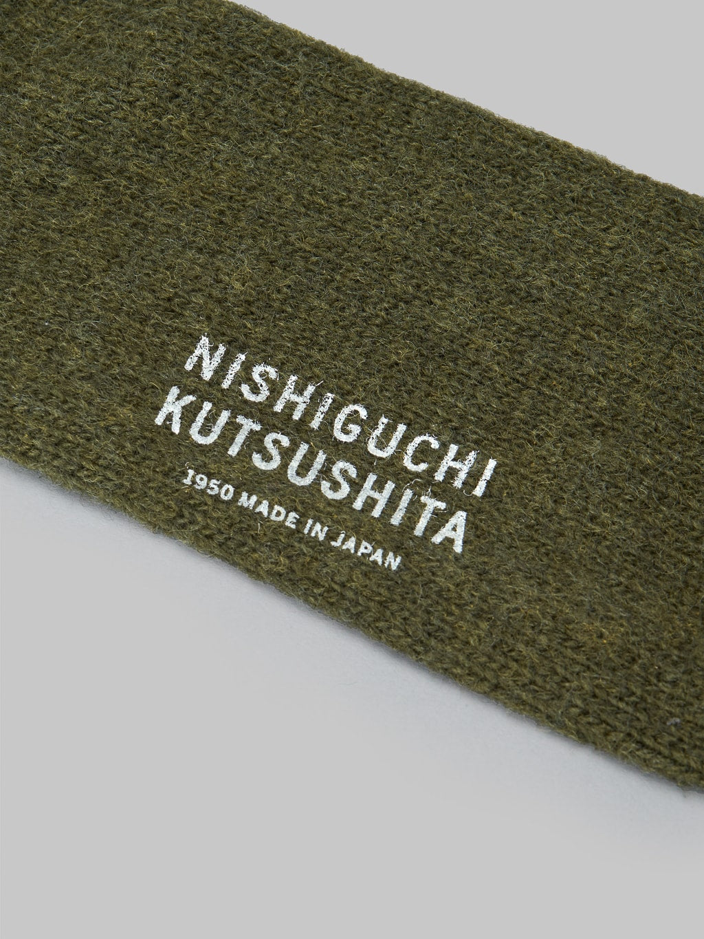 Nishiguchi Kutsushita Wool Ribbed Socks Khaki Brand Logo