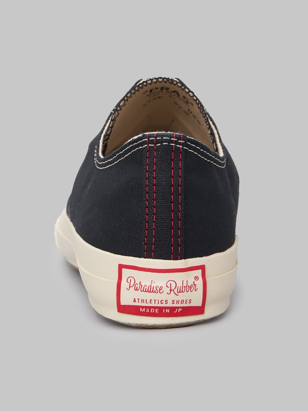 Pras shellcap low sneakers kuro off black sole brand tag