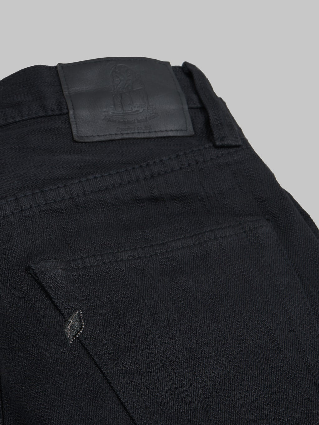 Pure Blue Japan Stretch Black Relaxed Tapered Jeans leather patch