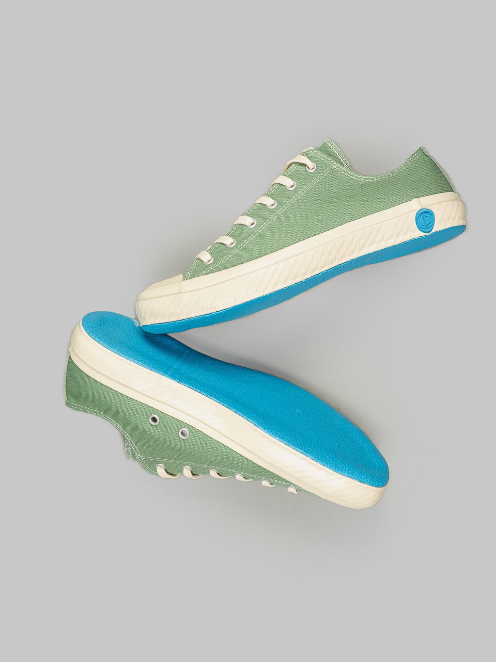 Shoes like pottery low sneaker green bright blue rubber sole