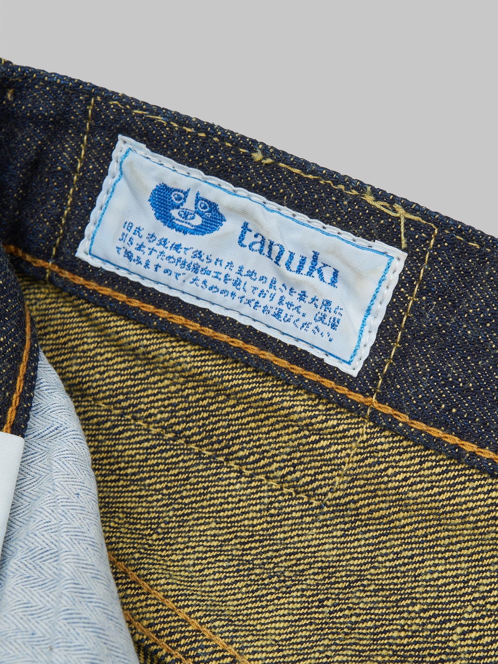 Tanuki Soga 15oz selvedge denim high tapered jeans tumeric interior tag