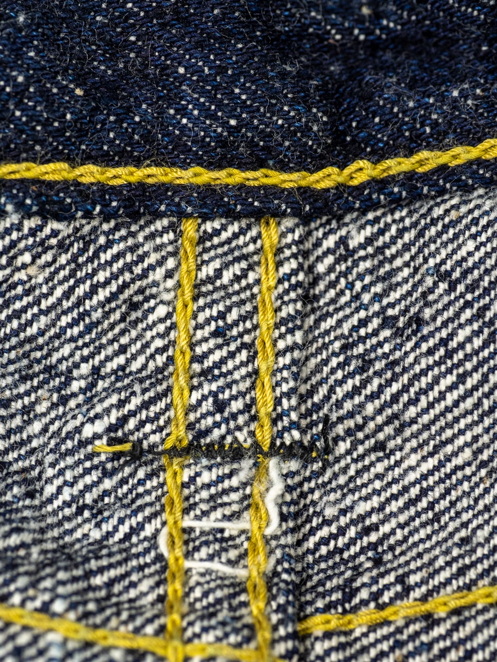 The Strike Gold Keep Earth Natural Indigo Jeans stitching detail