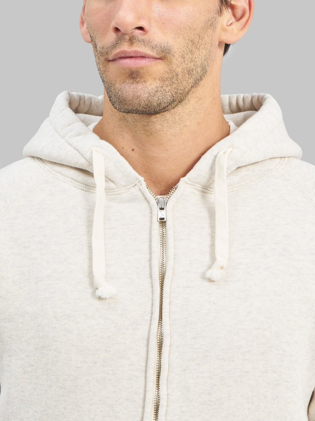the strike gold zip hoodie oatmeal front details