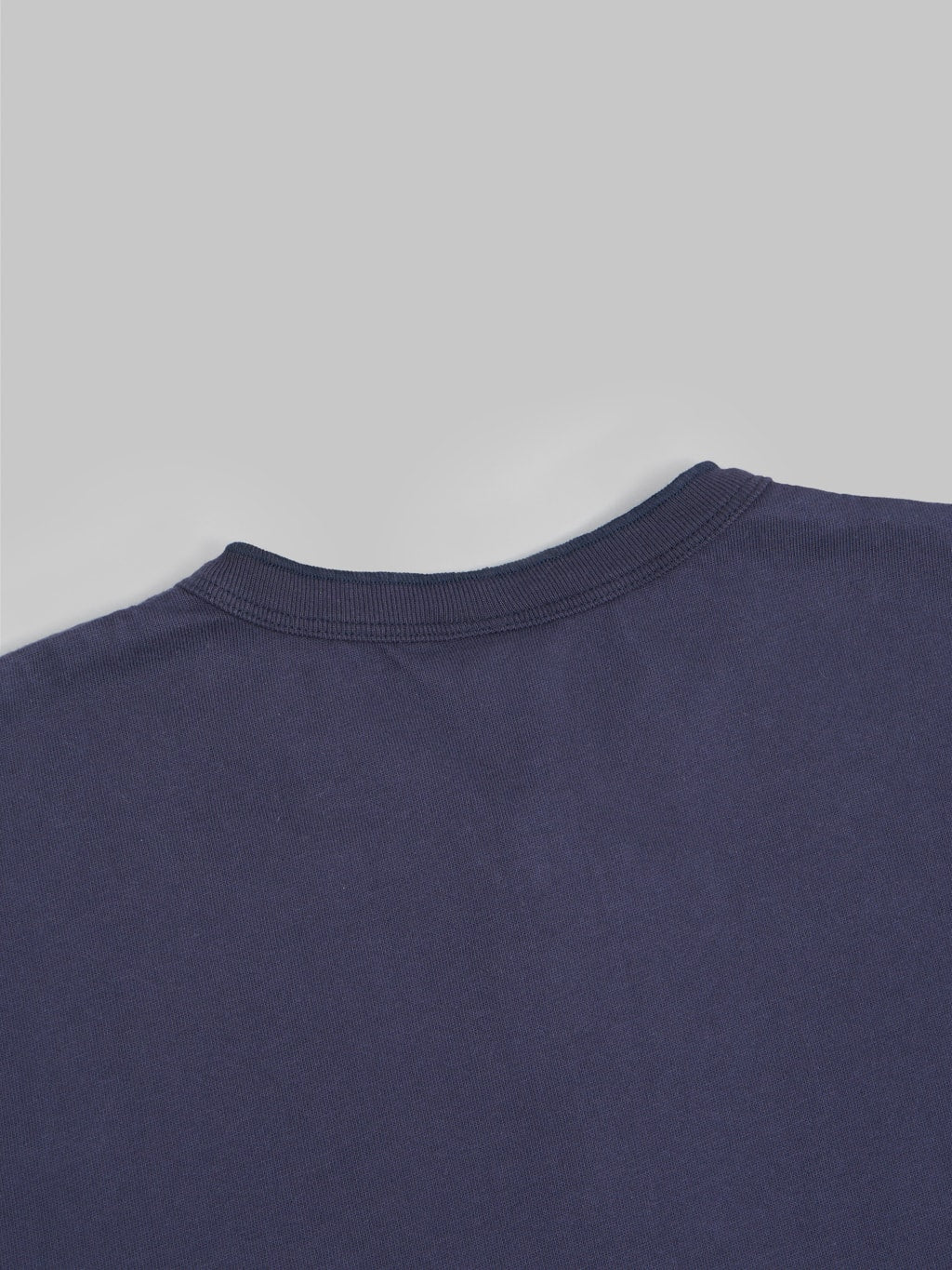 UES Ramayana crewneck pocket TShirt navy stitching