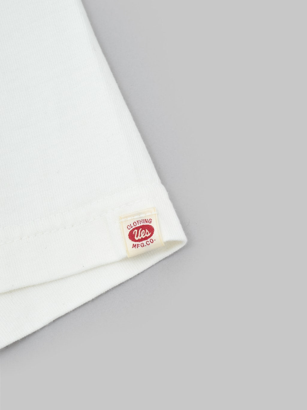 UES Ramayana crewneck pocket TShirt white front logo