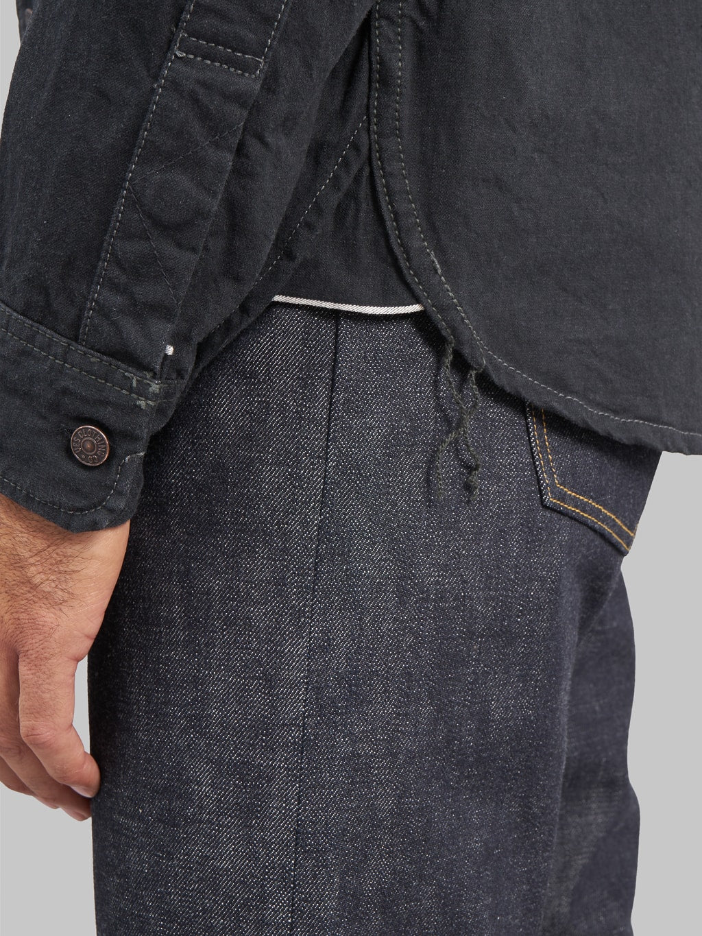 UES traveling shirt black chain stitching detail