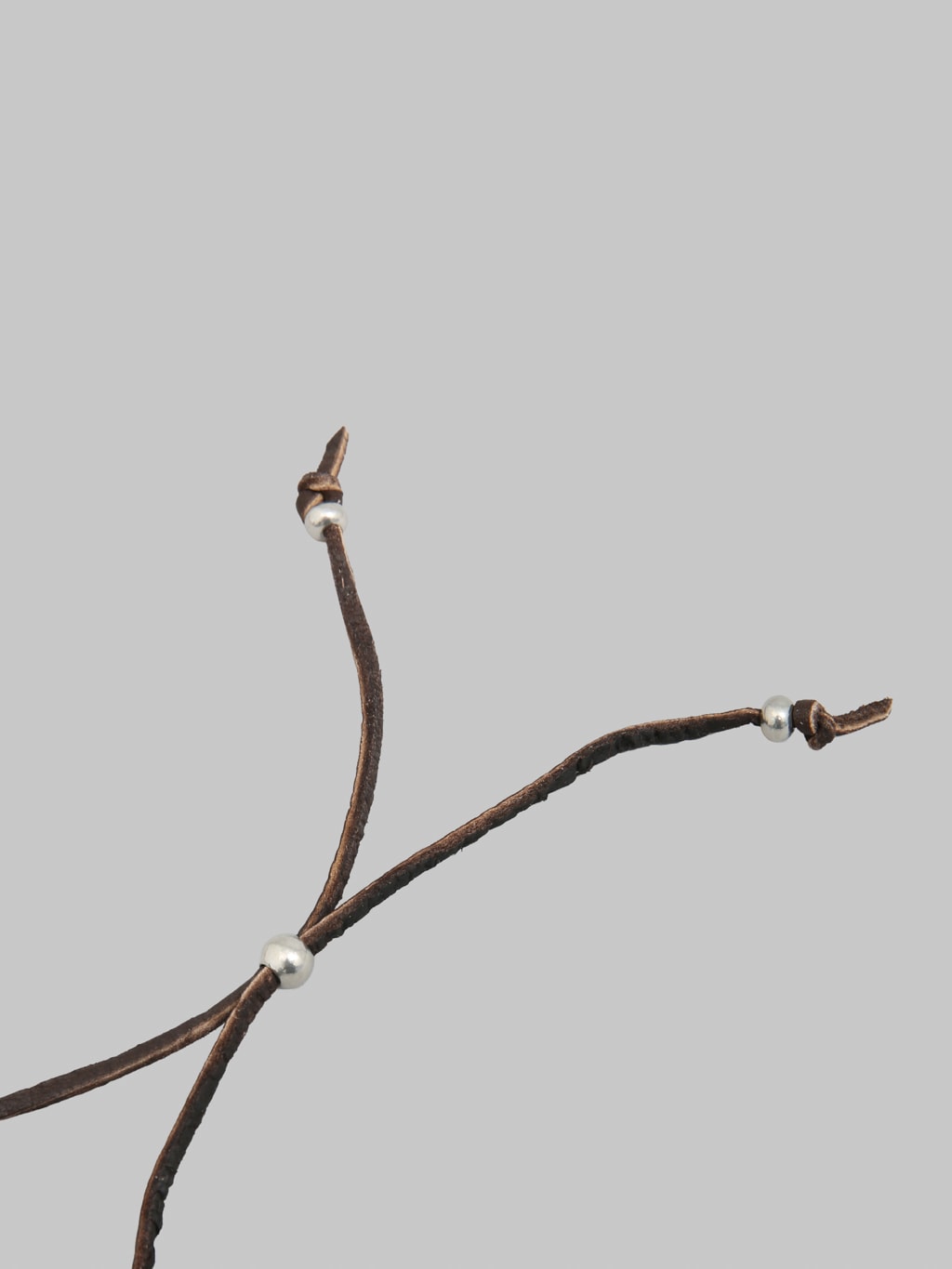 Kobashi Studio Suzu Sunglass Strap Dark Brown silver leather lace ring