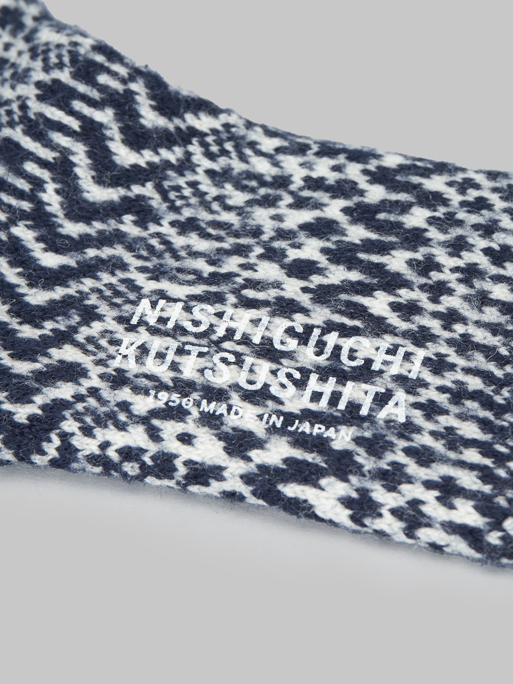 Nishiguchi Kutsushita Wool Jacquard Socks Berlin Blue brand logo stamped
