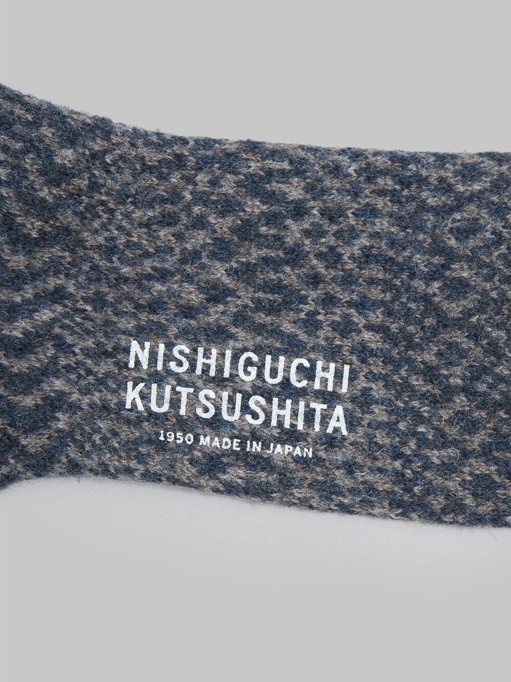 Nishiguchi Kutsushita Wool Jacquard Socks Navy Brand Logo