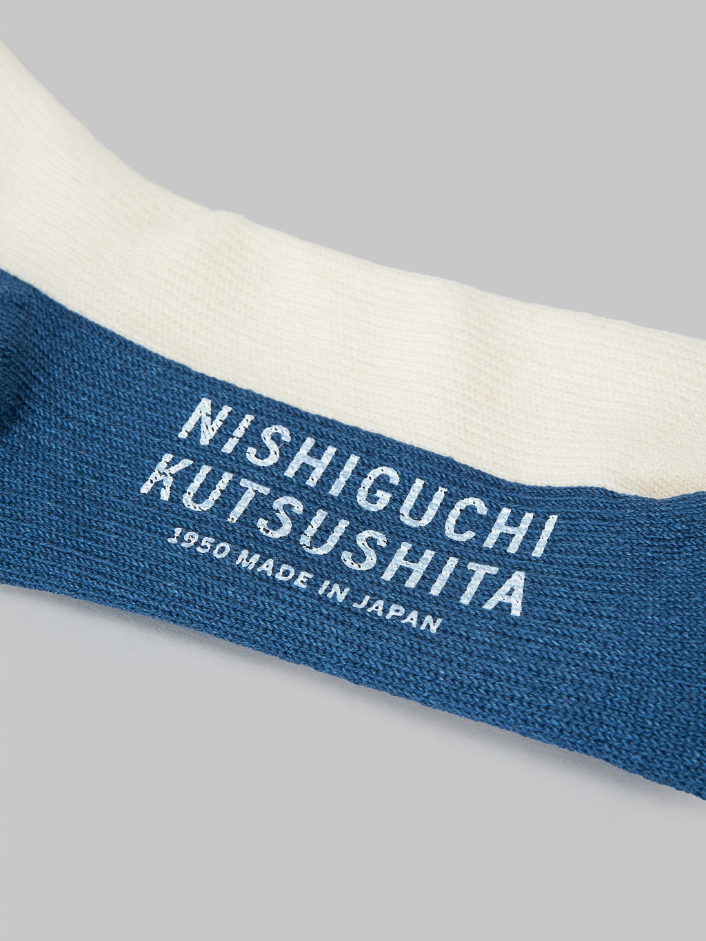 Nishiguchi Kutsushita Wool Pile Walk Socks Ivory brand logo stamped
