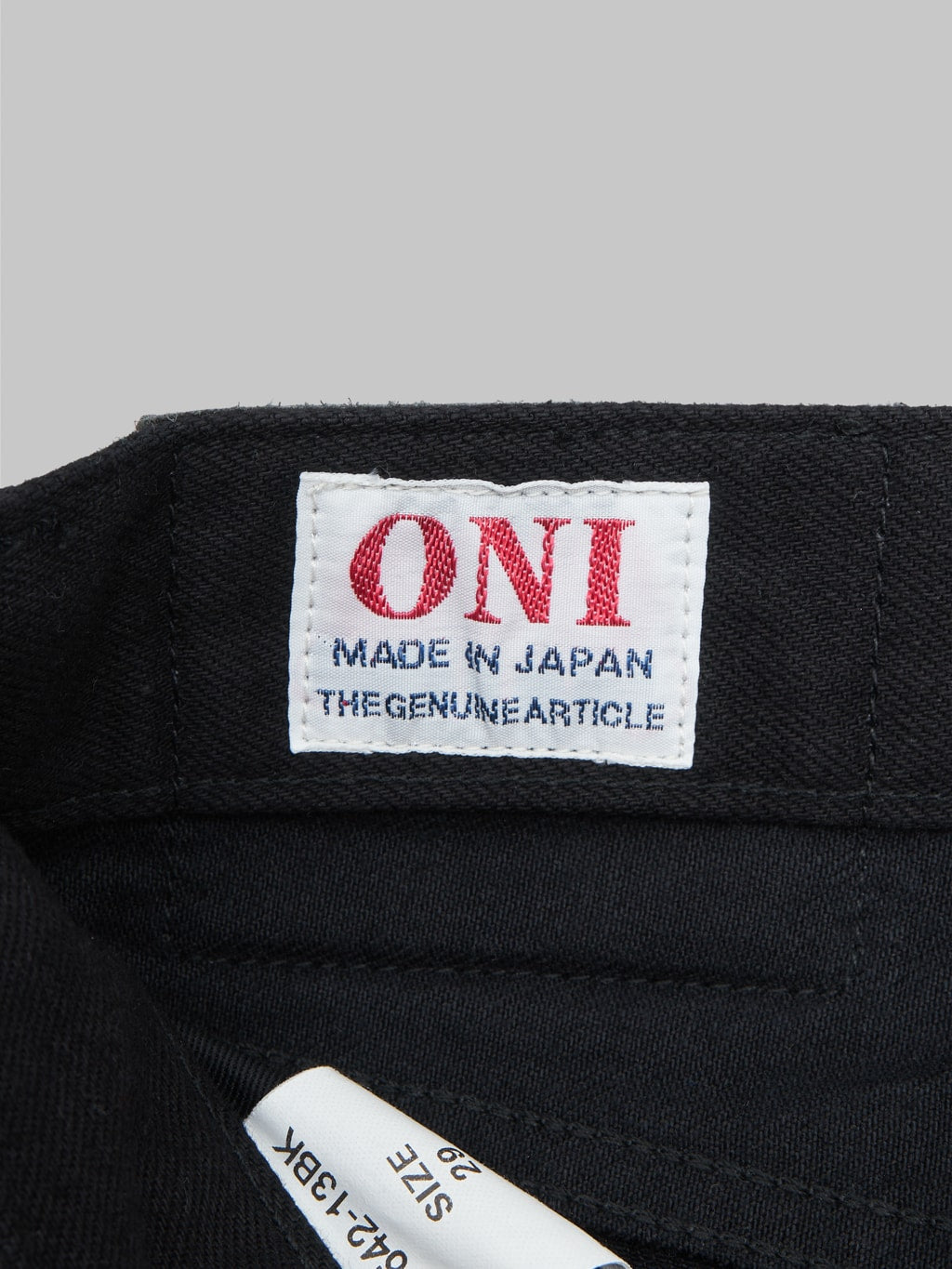 oni 286 jet black denim 13oz neat straight selvedge jeans interior tag