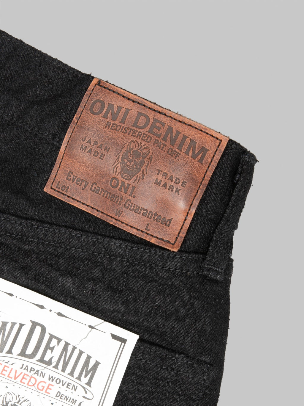ONI Denim CCD Black x Black Kabuki Relaxed Tapered Jeans leather patch
