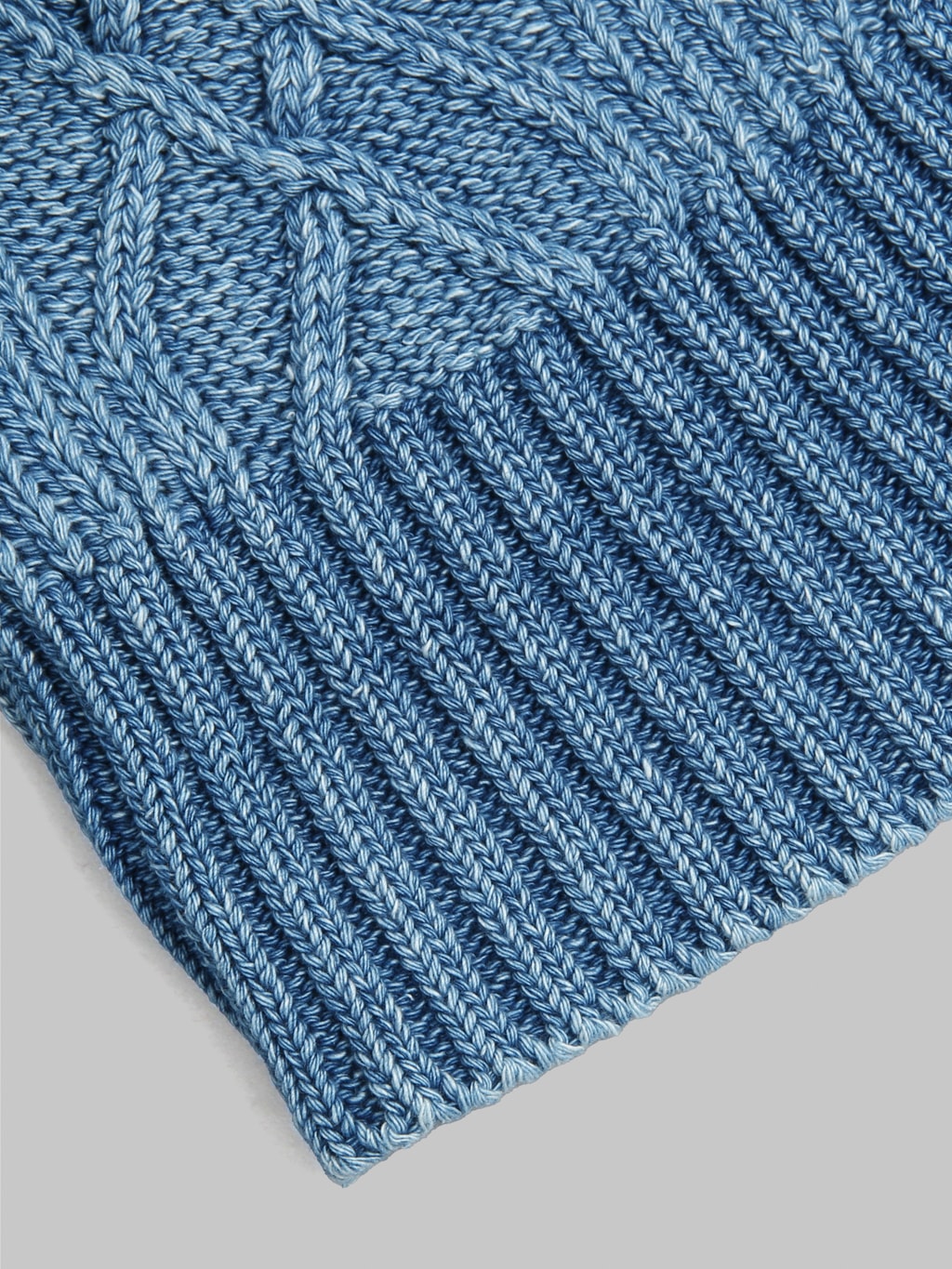 rototo aran cable indigo watch cap light denim closeup