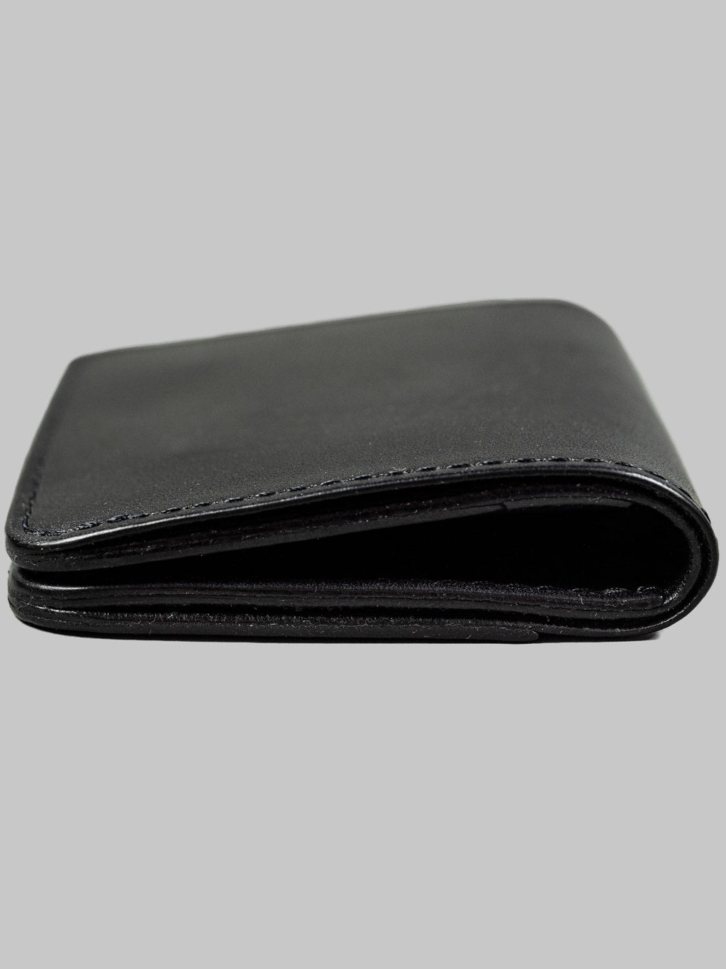 Studio Dartisan black  leather mini wallet side view