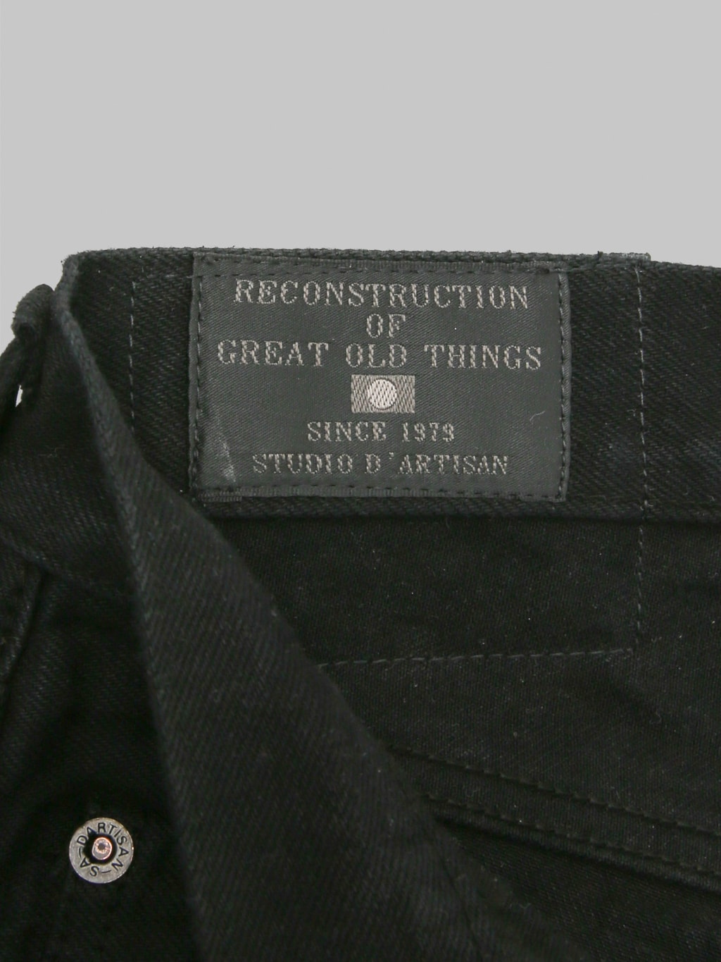 Studio DArtisan D1899 Kyoto Super Black Dyed Relaxed Tapered Jeans brand tag