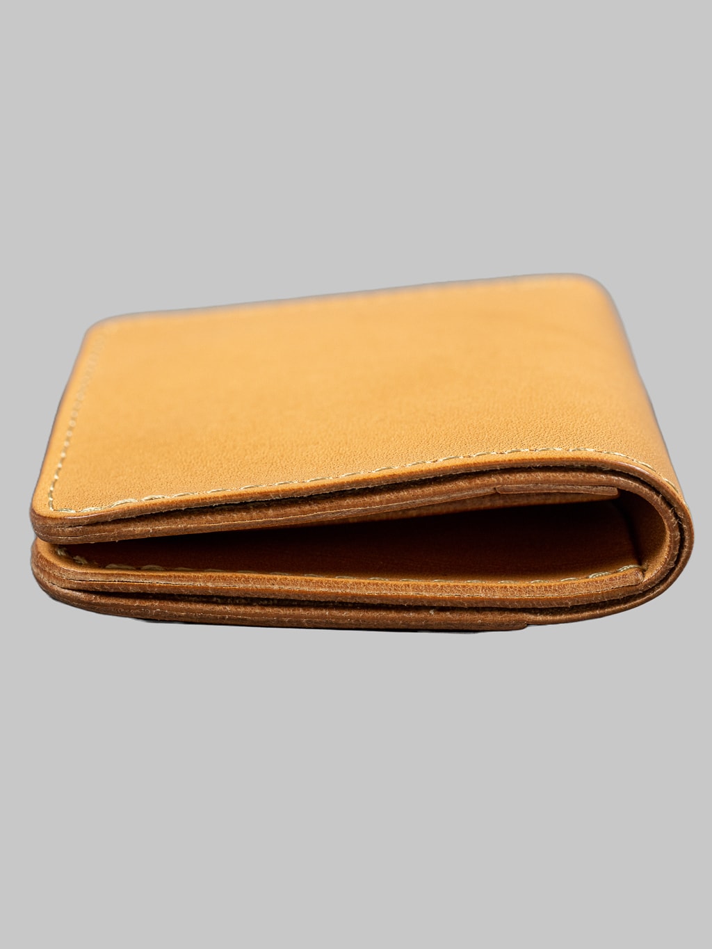 Studio Dartisan natural leather mini wallet side view