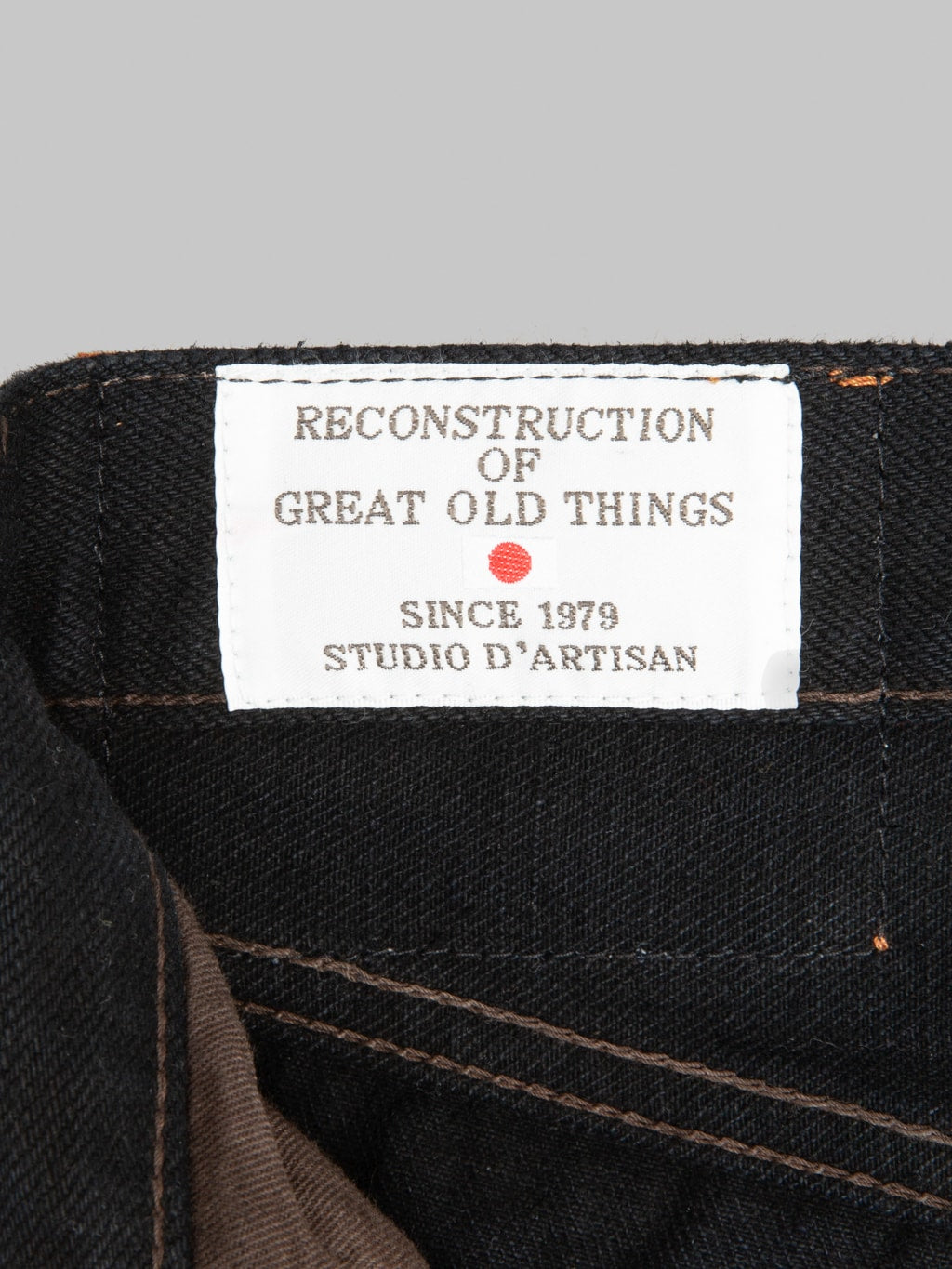 Studio DArtisan SP120 Amami Dorozome 45th Anniversary Regular Straight Jeans tag closeup