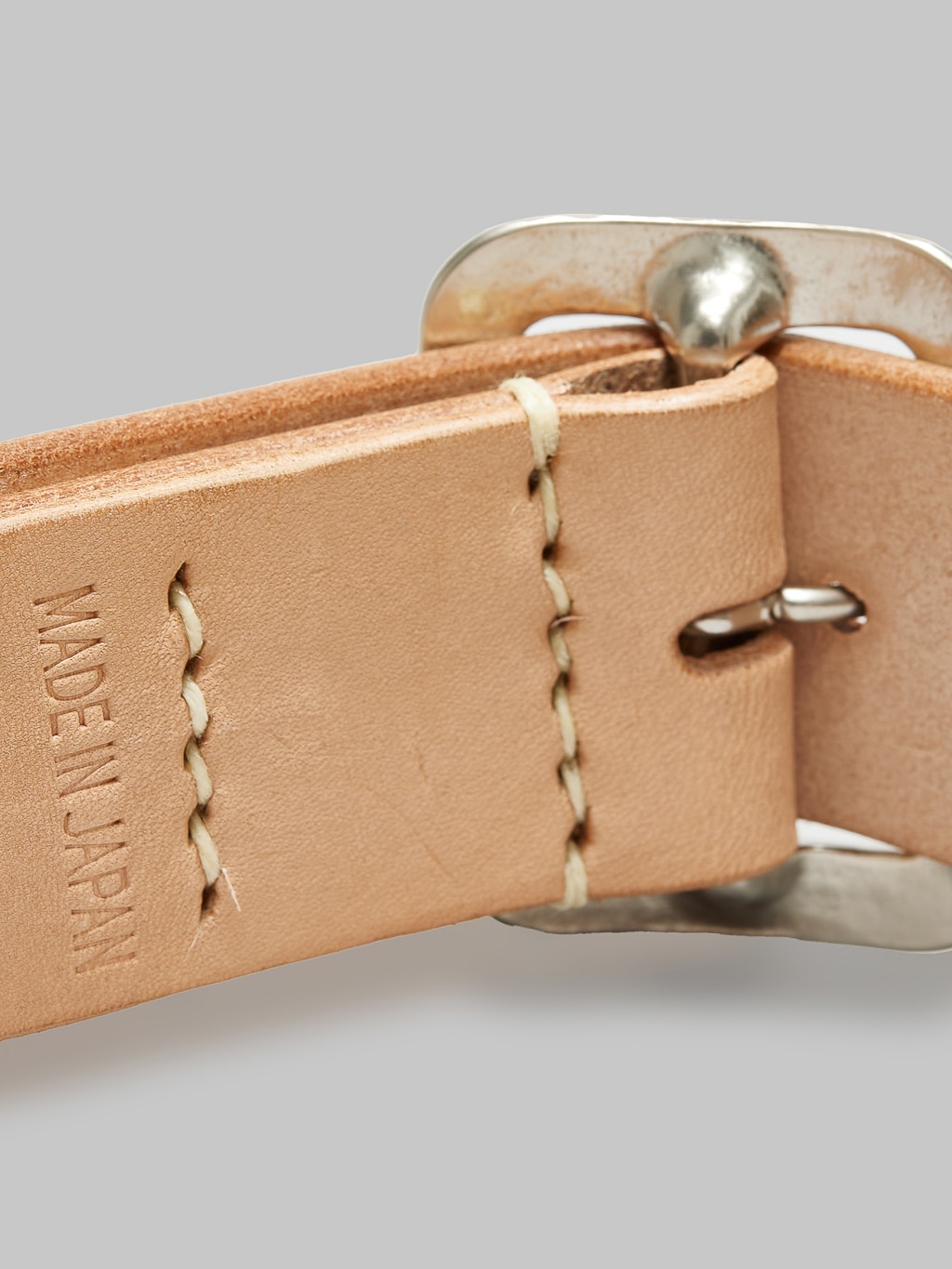 Sugar Cane leather garrison belt tan stitching detail