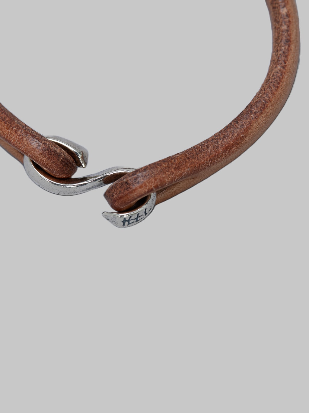 The Flat Head Leather Silver Bracelet Tan clasp finish
