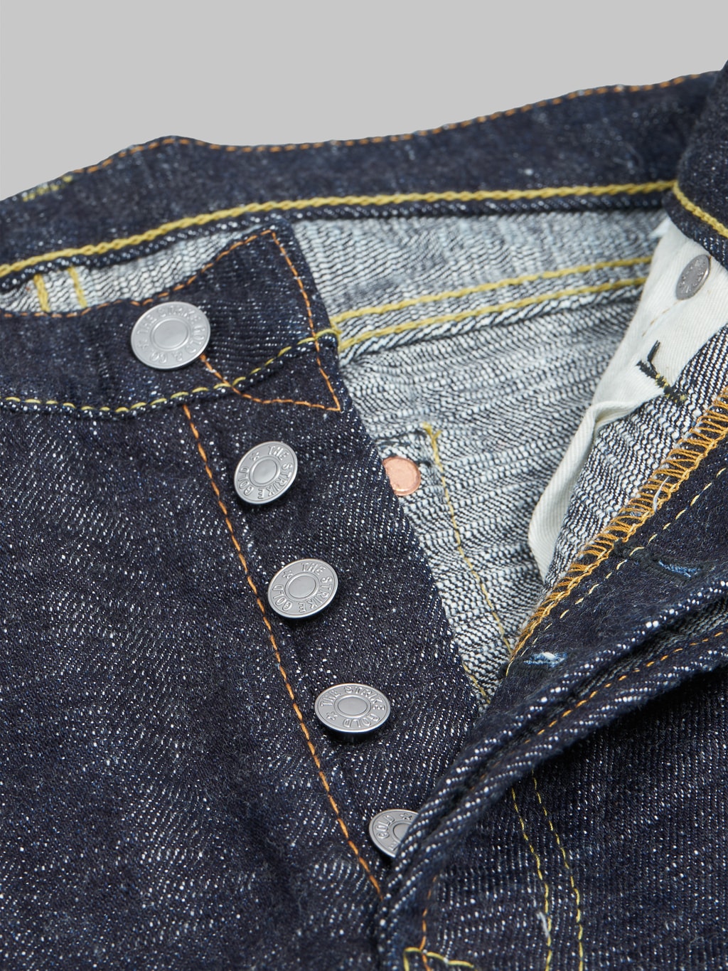 the strike gold 7104 ultra slubby straight tapered jeans  iron buttons