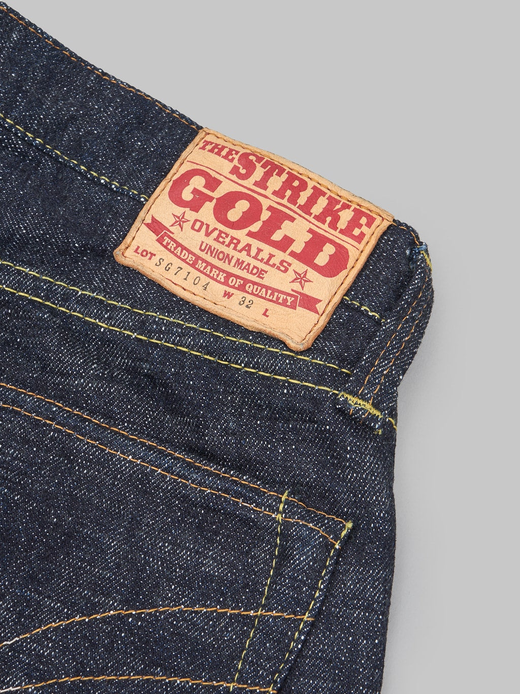 the strike gold 7104 ultra slubby straight tapered jeans  leather patch