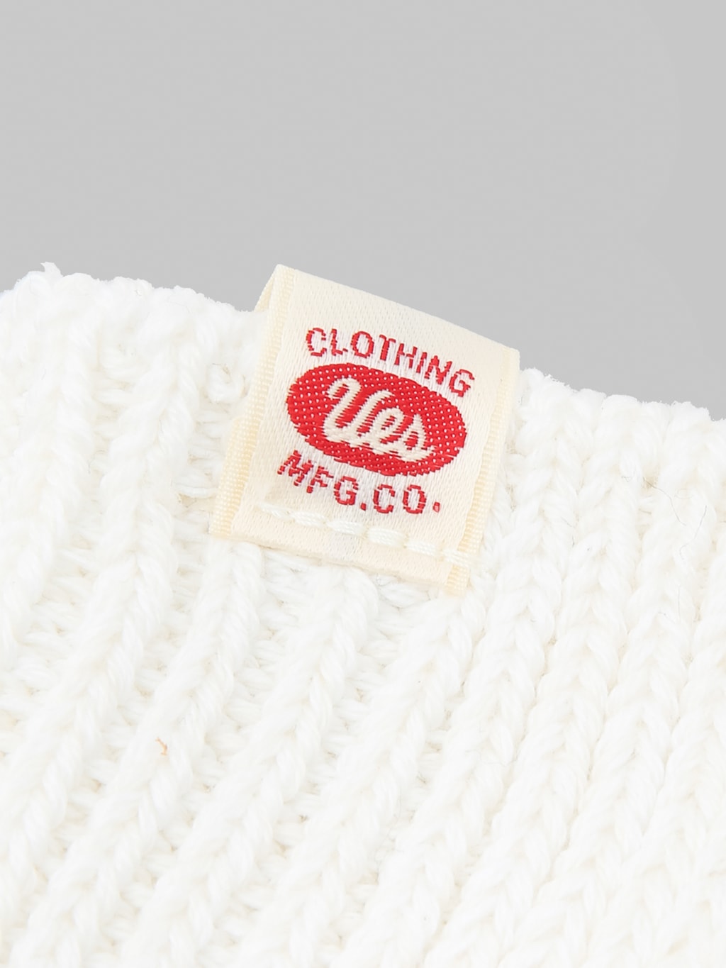 UES Crew Length Socks White logo tag