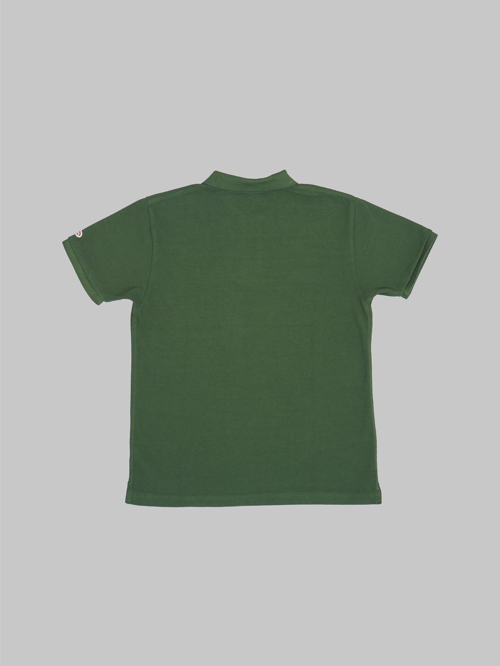 ues polo shirt green back