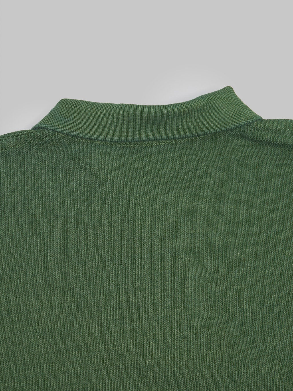 ues polo shirt green back collar