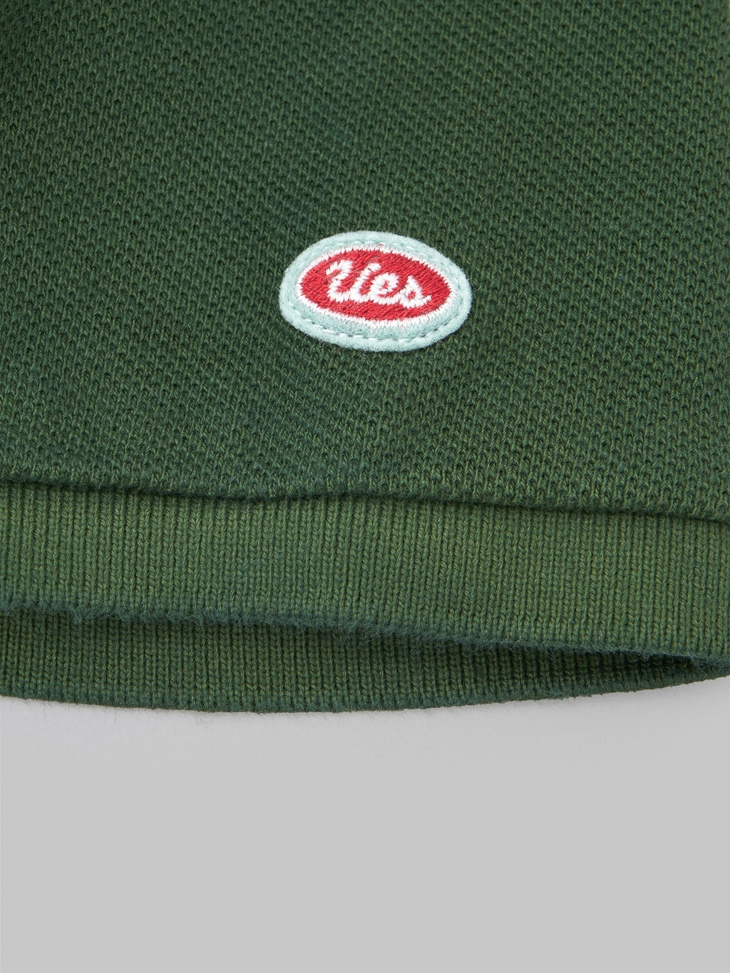 ues polo shirt green brand logo