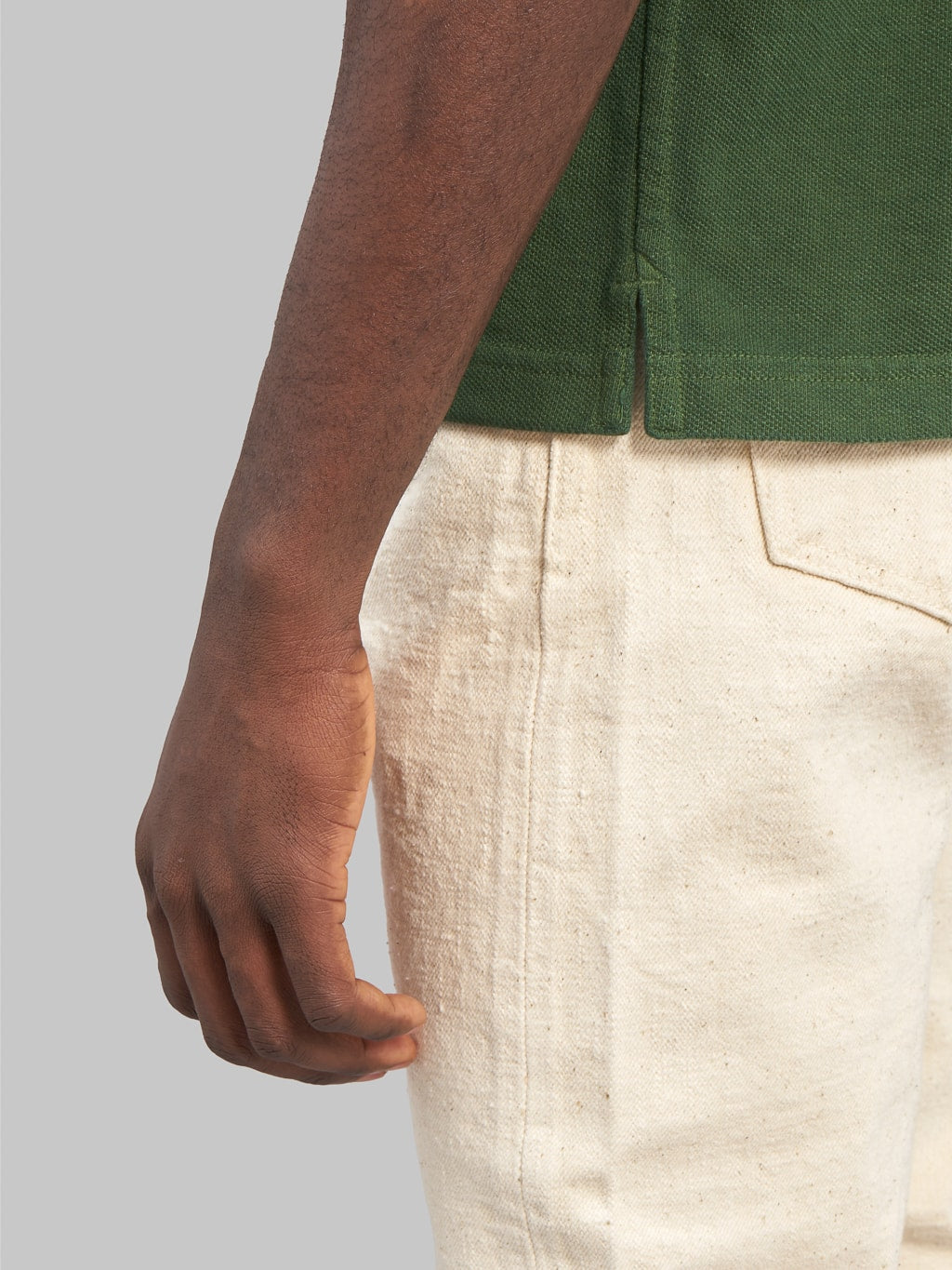 ues polo shirt green details