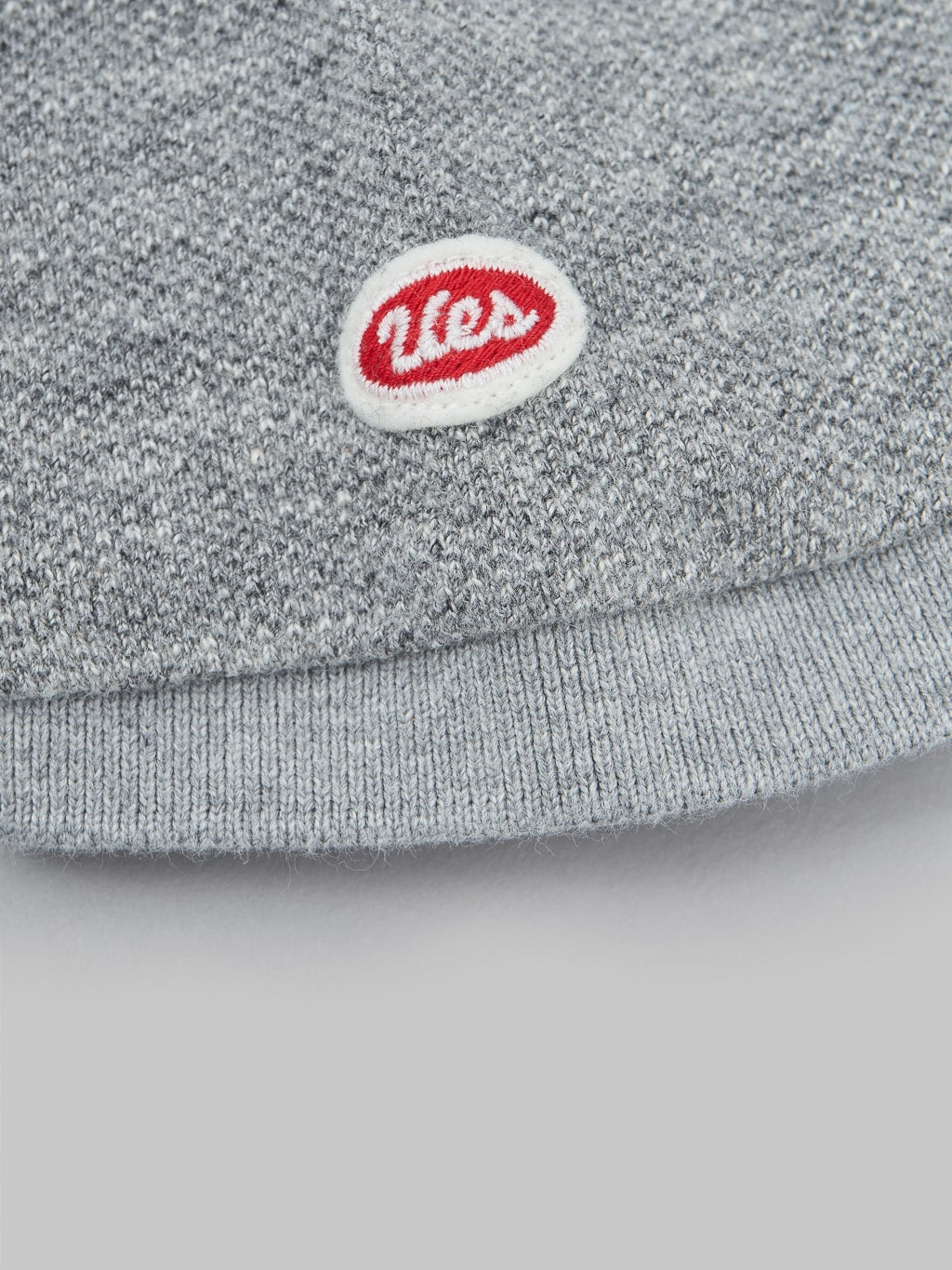ues polo shirt grey brand logo stitching