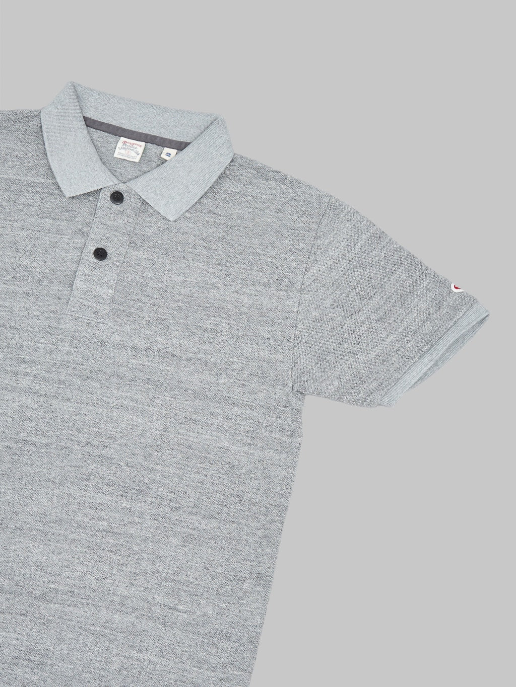 ues polo shirt grey sleeve detail