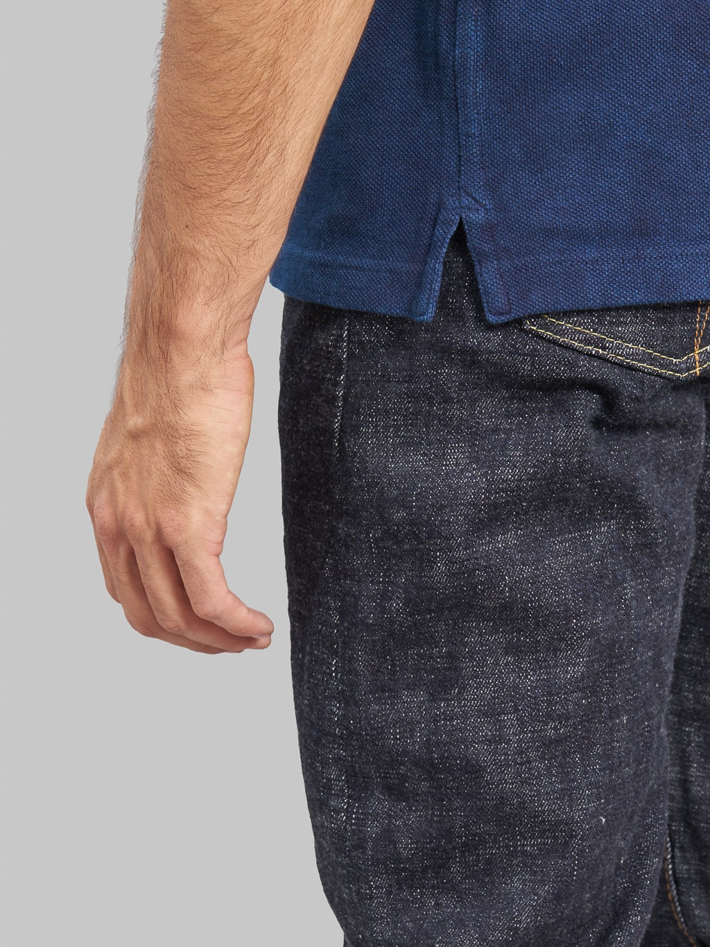 ues polo shirt indigo side hem finish