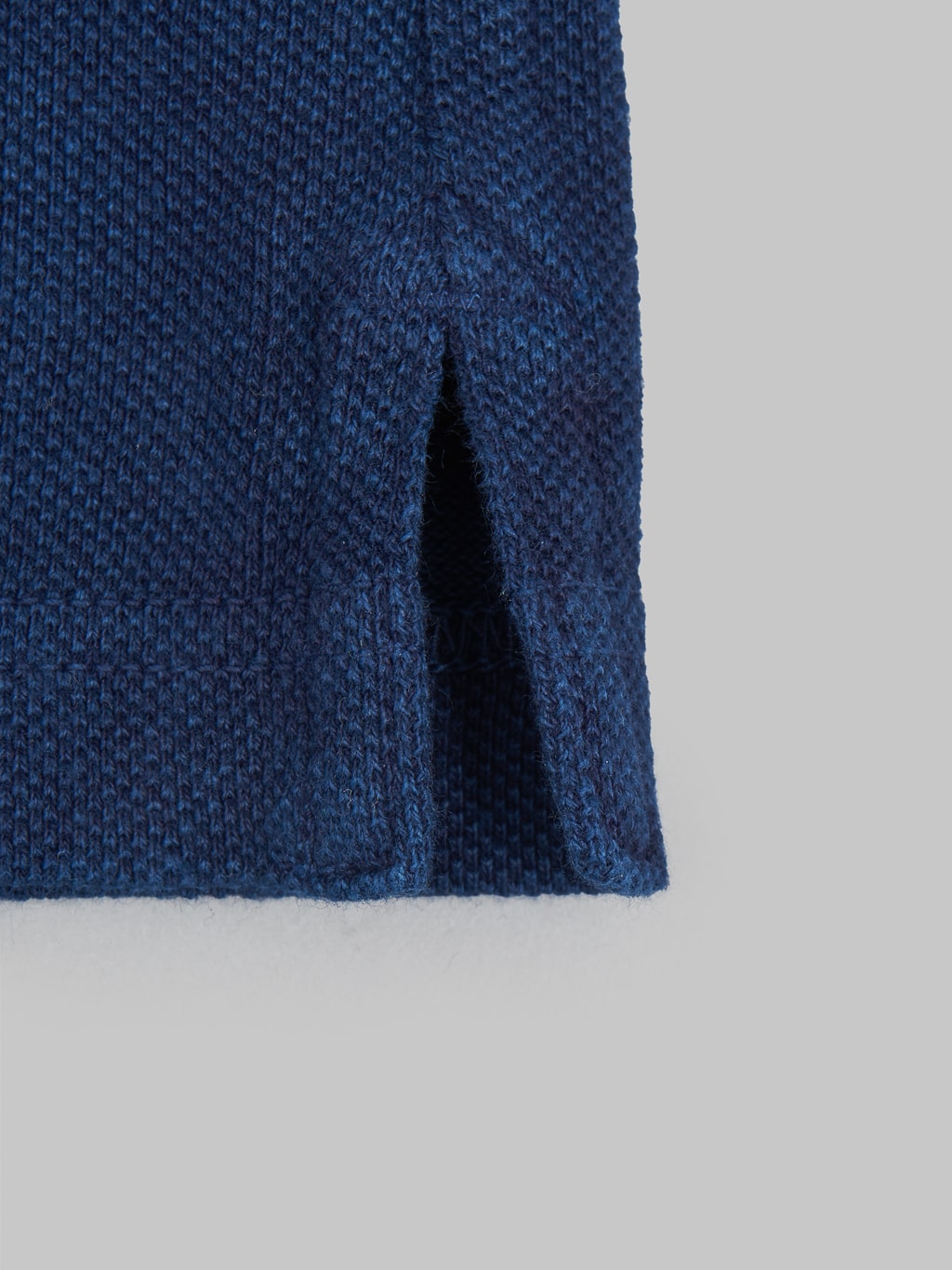 ues polo shirt indigo hem detail texture