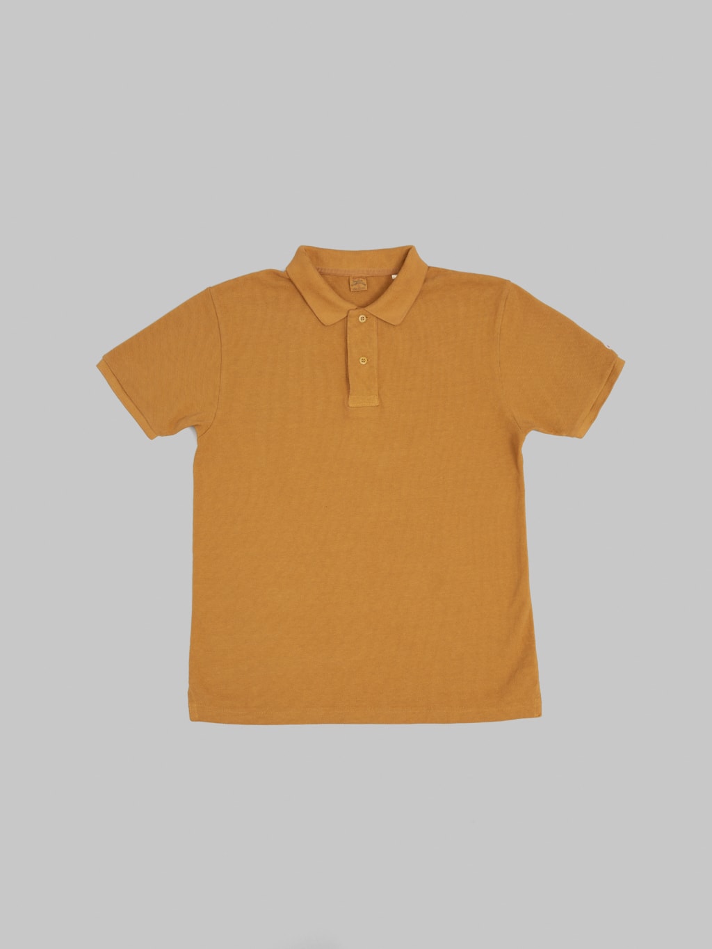 UES Polo Shirt Mustard front