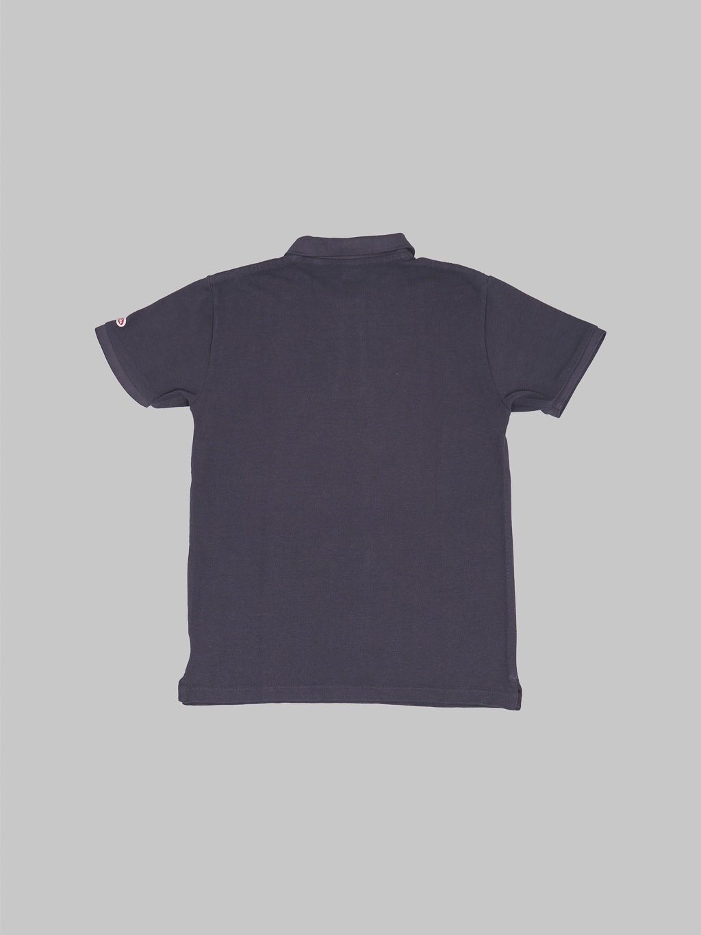 ues polo shirt navy back view