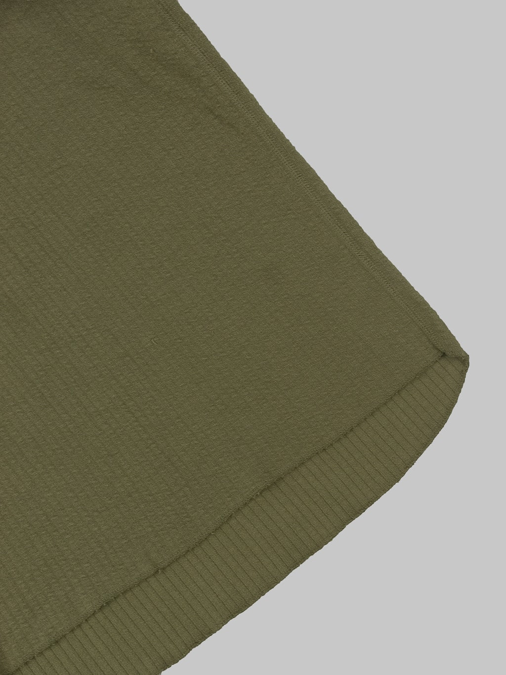 Loop Weft Double Face Jacquard crewneck Thermal army olive hem closeup