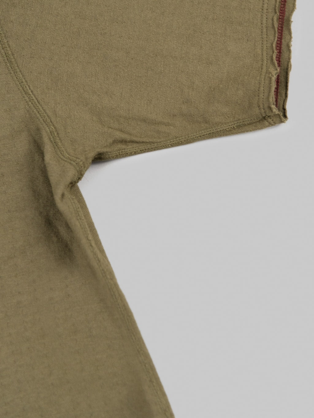 Loop and Weft Dual Layered Knit raw edge pocket TShirt olive sleeve