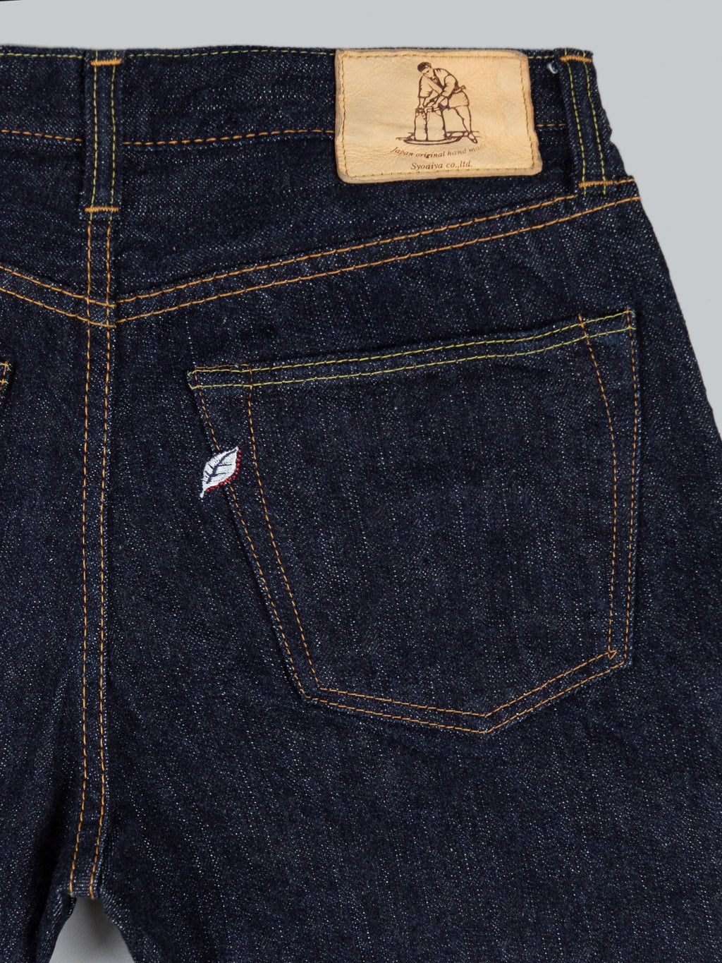 Pure Blue Japan Relaxed Tapered denim jeans brand logo