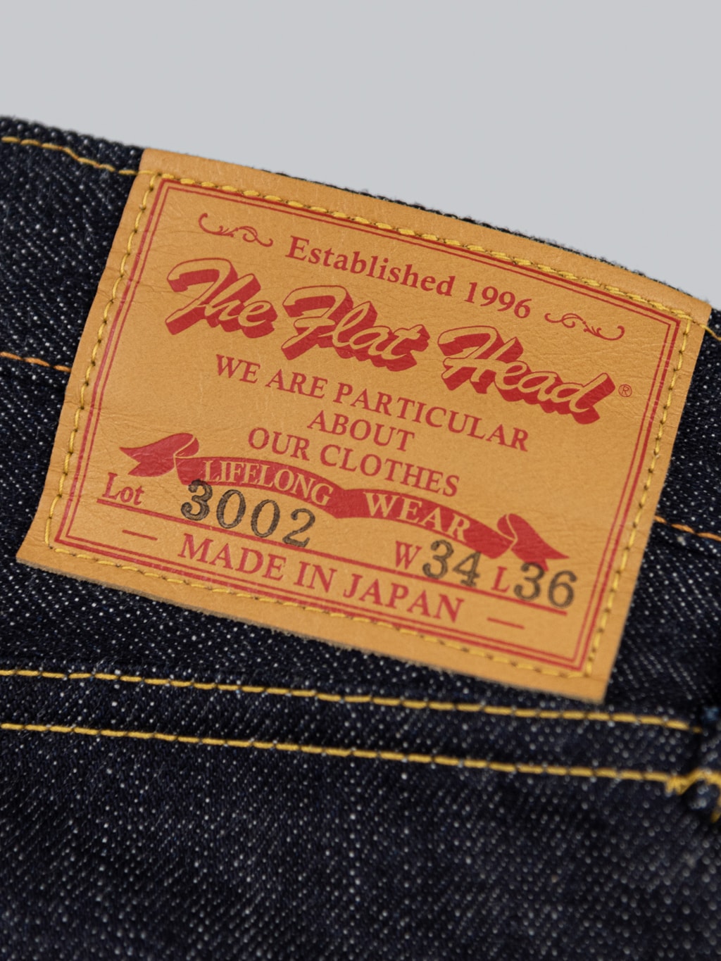 The Flat Head 3002 14.5oz Slim Tapered selvedge Jeans deerskin leather patch