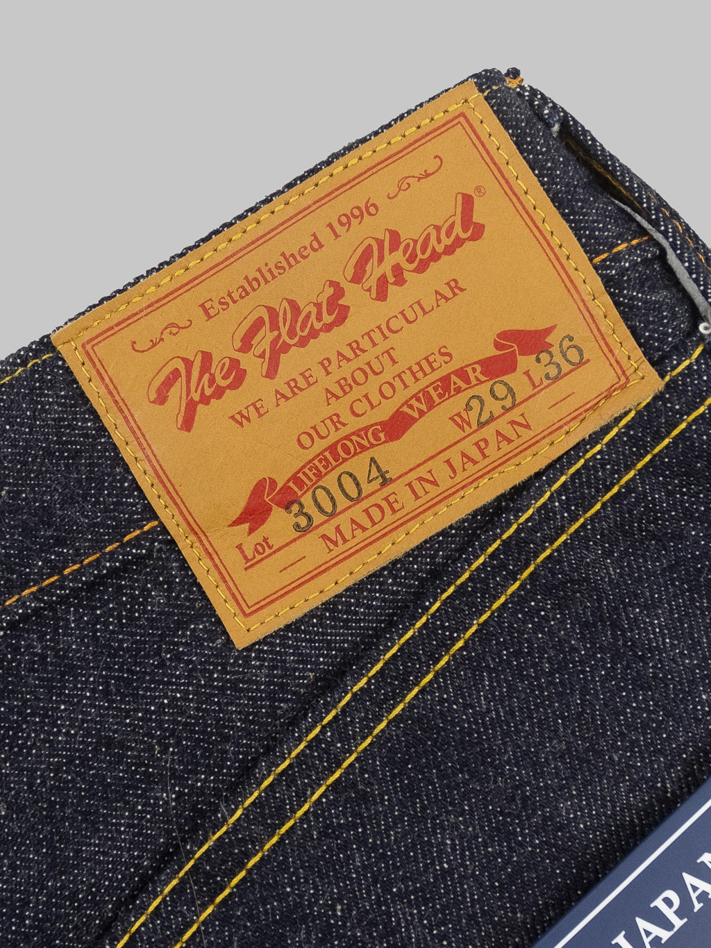 The Flat Head 3004 Regular Straight Jeans leather patch
