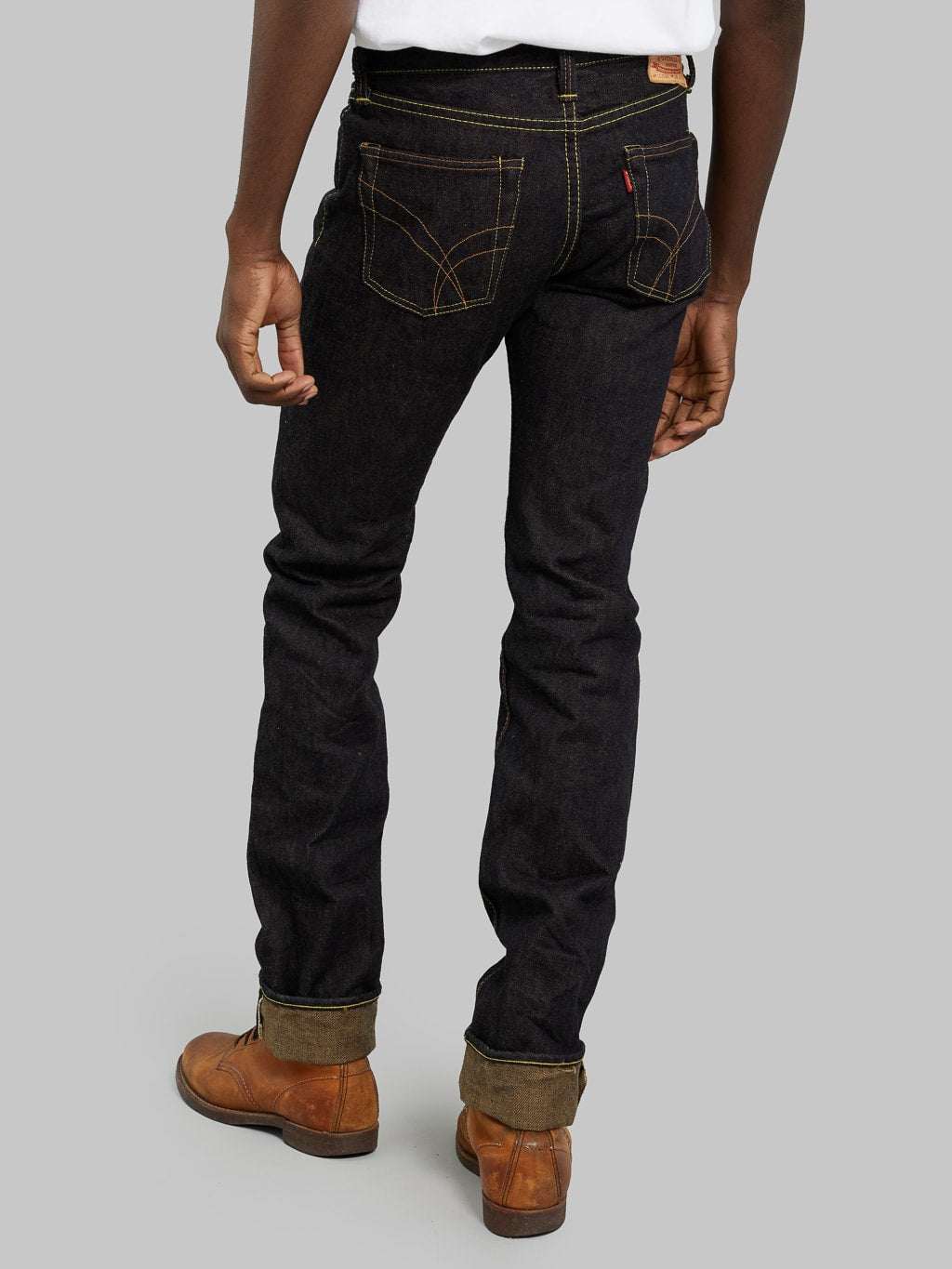 The Strike Gold Brown Weft Slim Jeans back fit