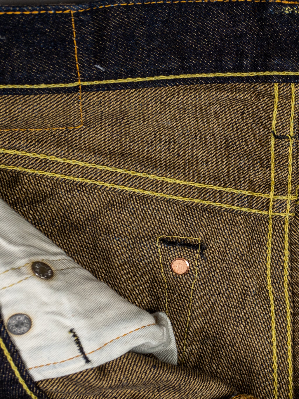 The Strike Gold Brown Weft Slim Straight Jeans interior