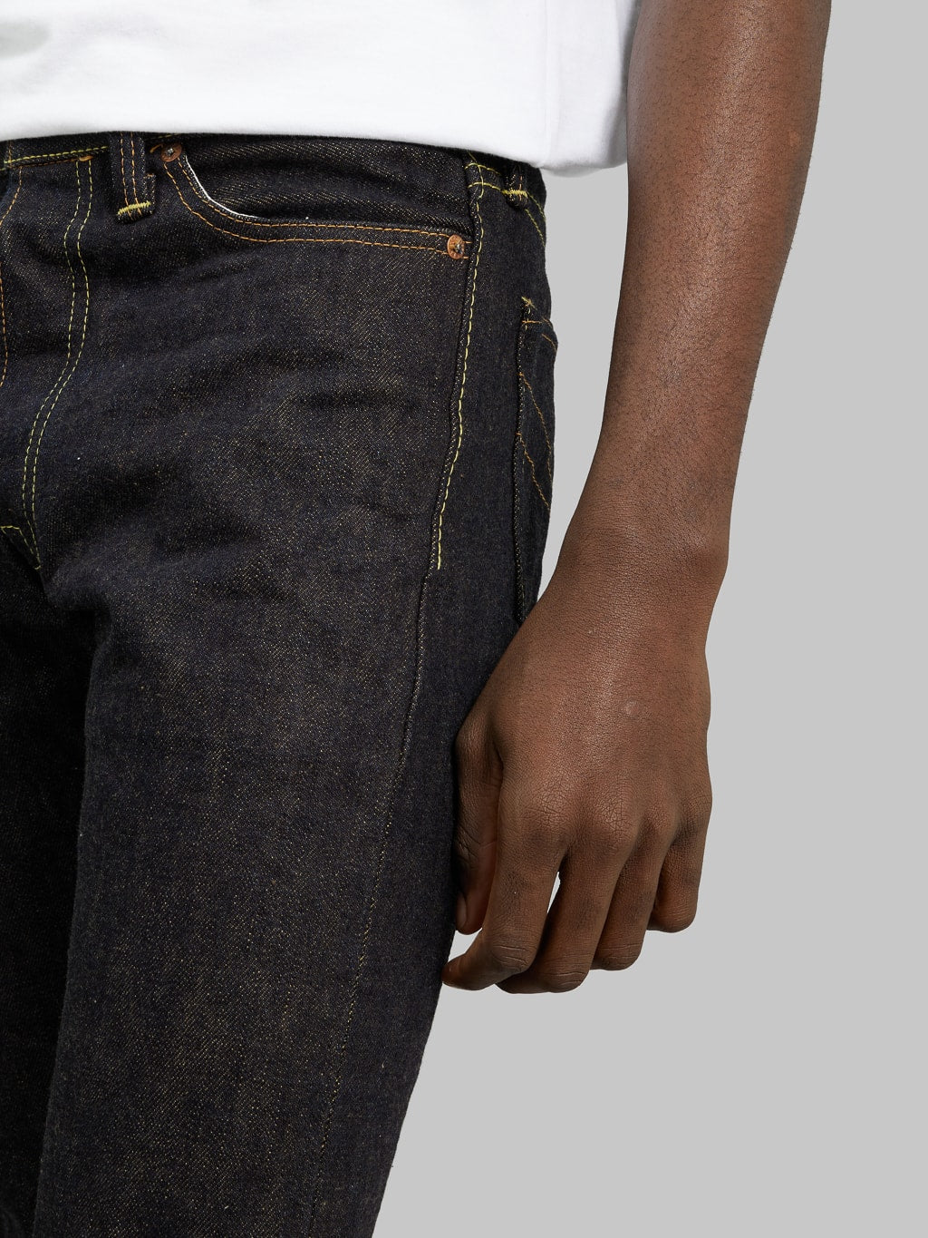 The Strike Gold Brown Weft Slim Jeans front pocket