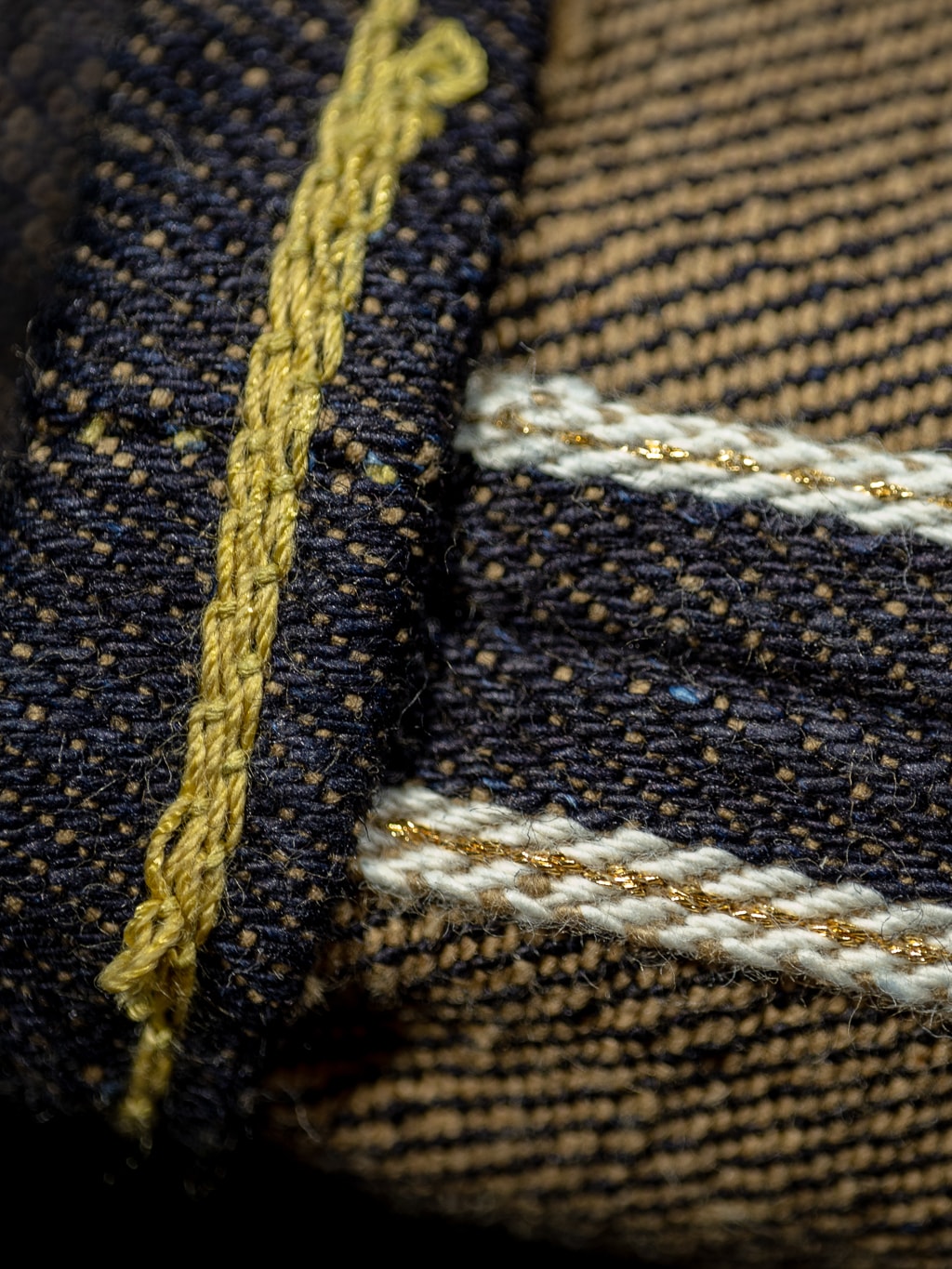 The Strike Gold Brown Weft Slim Jeans gold selvedge detail