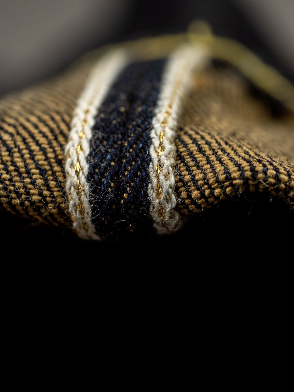 The Strike Gold Brown Weft Slim Jeans selvedge gold line