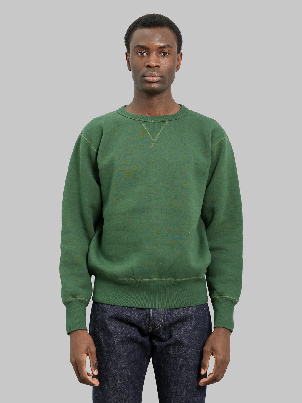 The Strike Gold Loopwheeled Sweatshirt Green model front fit